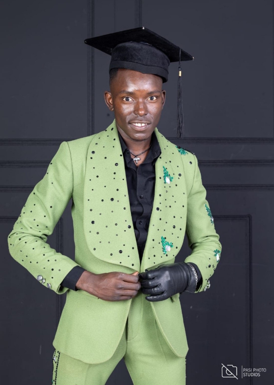 Green beaded graduation suit by ROXEI Designs